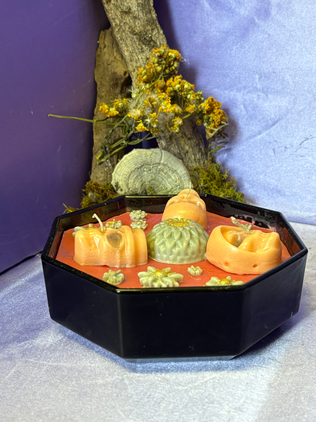 Skull Cluster Hex Candle  Mini skull candles layered over a bold base candle.